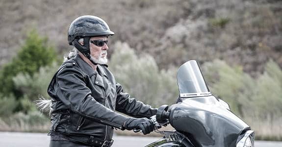 guy_on_a_motorcycle_575x300-1