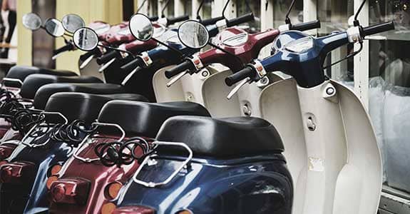 row_of_mopeds_575x300