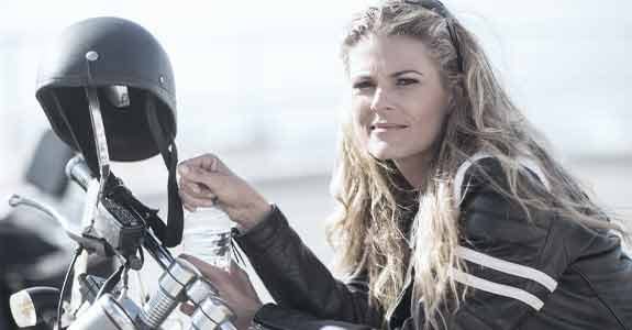 women_sitting_on_a_motorcycle_575x300