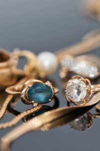 Various gold rings, necklaces, and pendants.