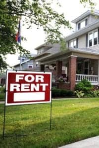 For Rent Sign In Front of Rental Property