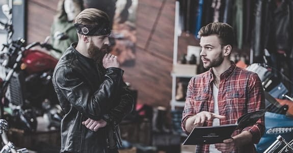 two_guys_talking_575x300