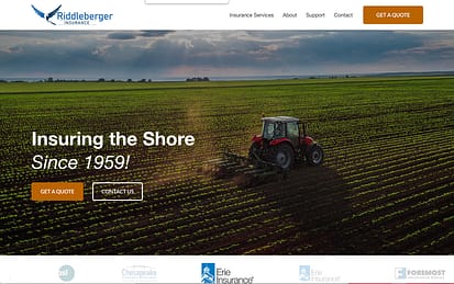 Riddleberger website home page with farmland and tractor in background.