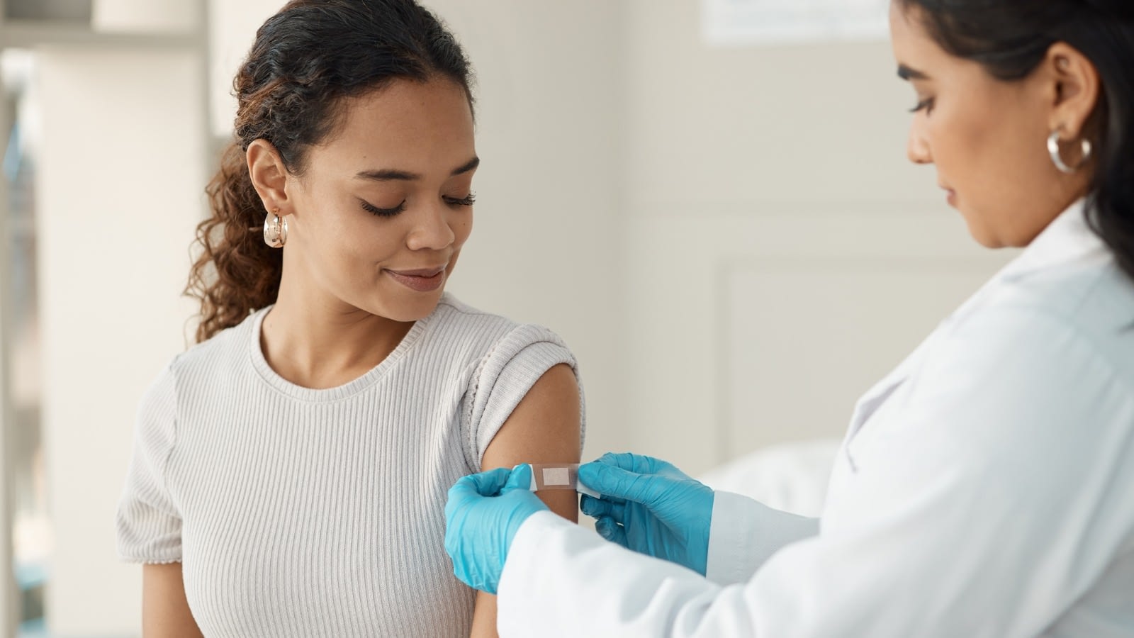 Woman just finished getting a shot