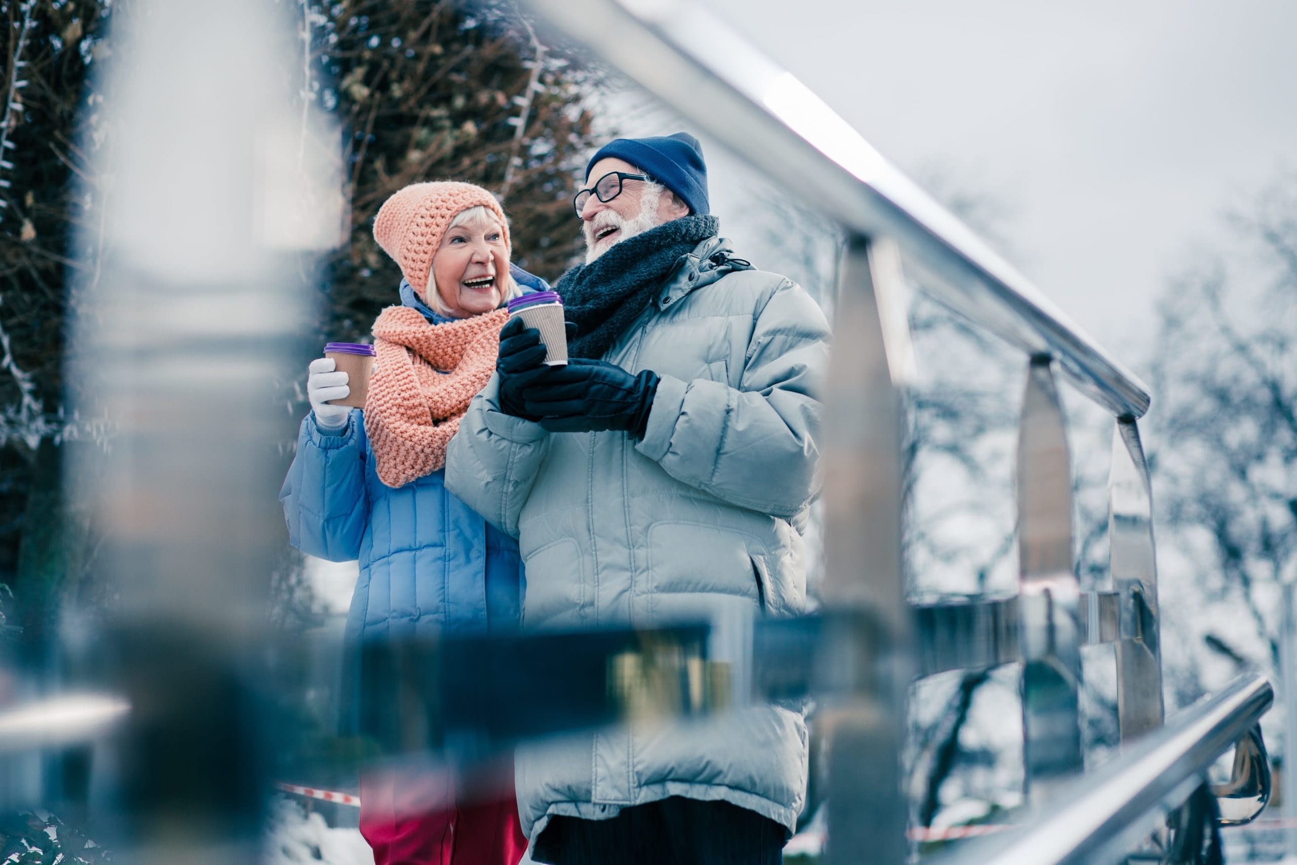 GettyImages-1182955195 Senior Couple Holding Cup In The Winter