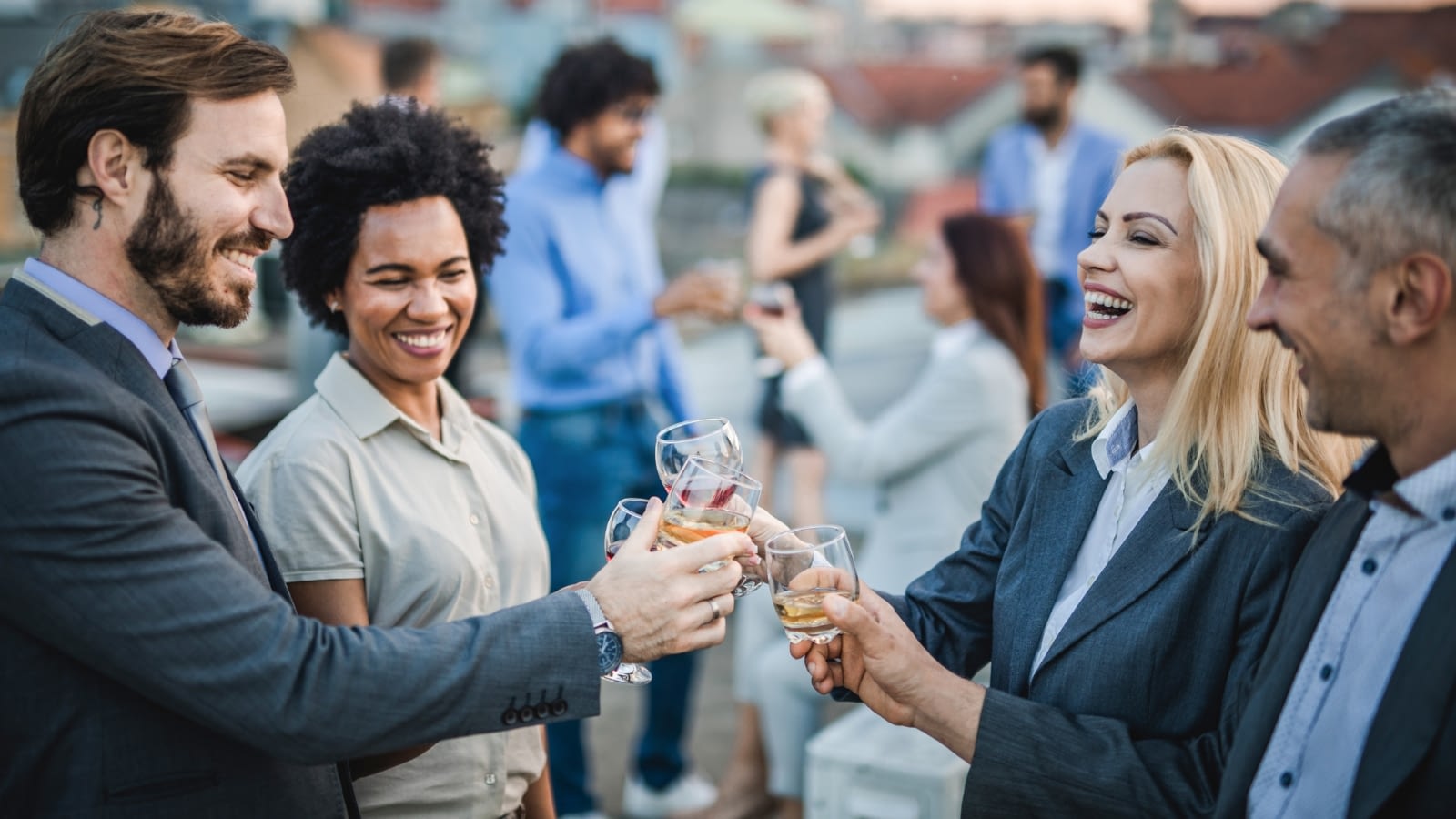 employees toasting at corporate event