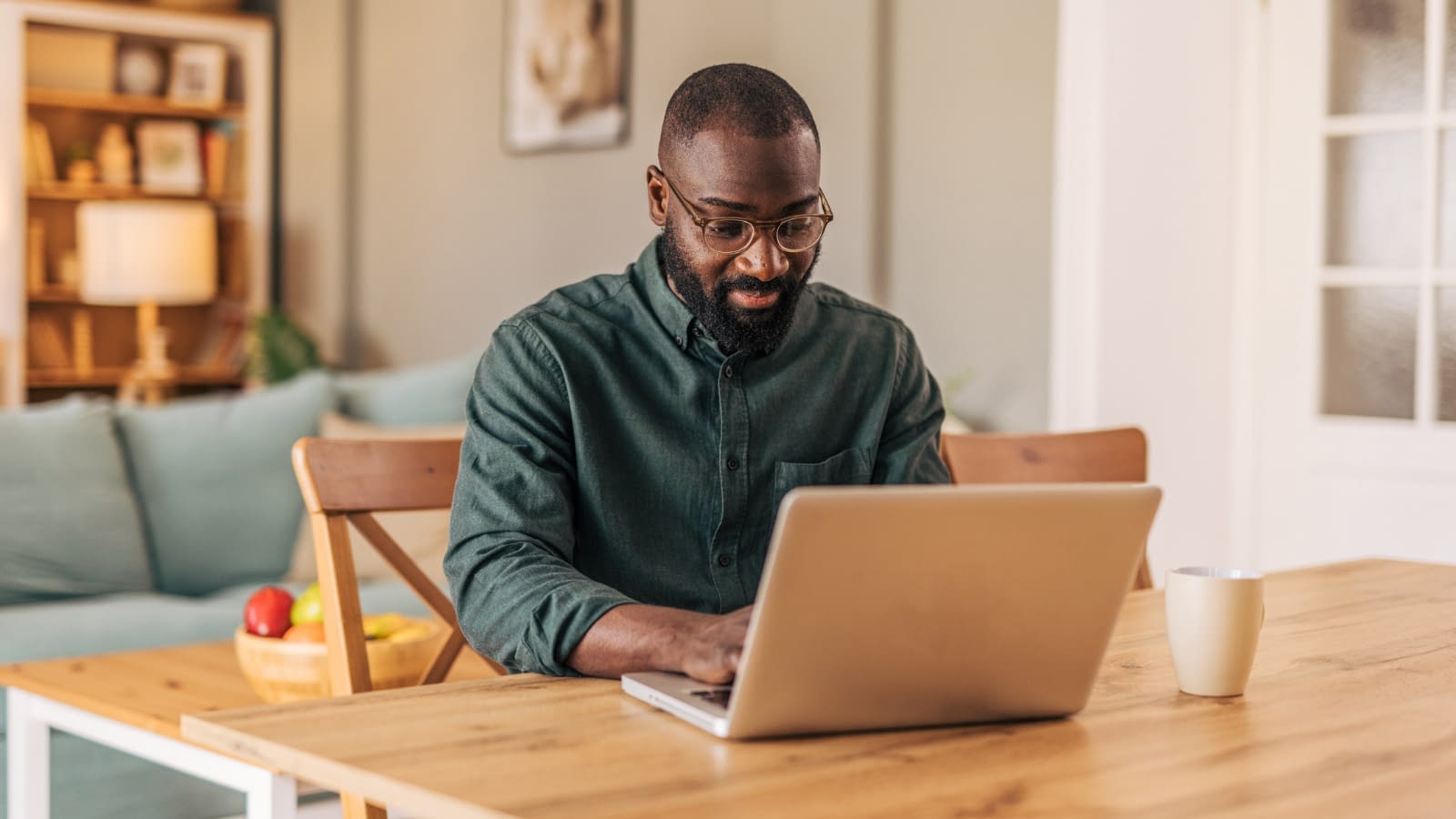 September 19 blog Young man reading about freelancer's insurance