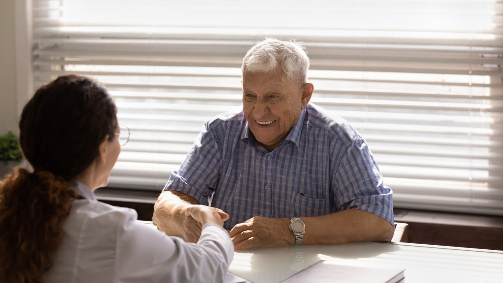 Dec 21 blog male senior citizen having discussion with medical provider