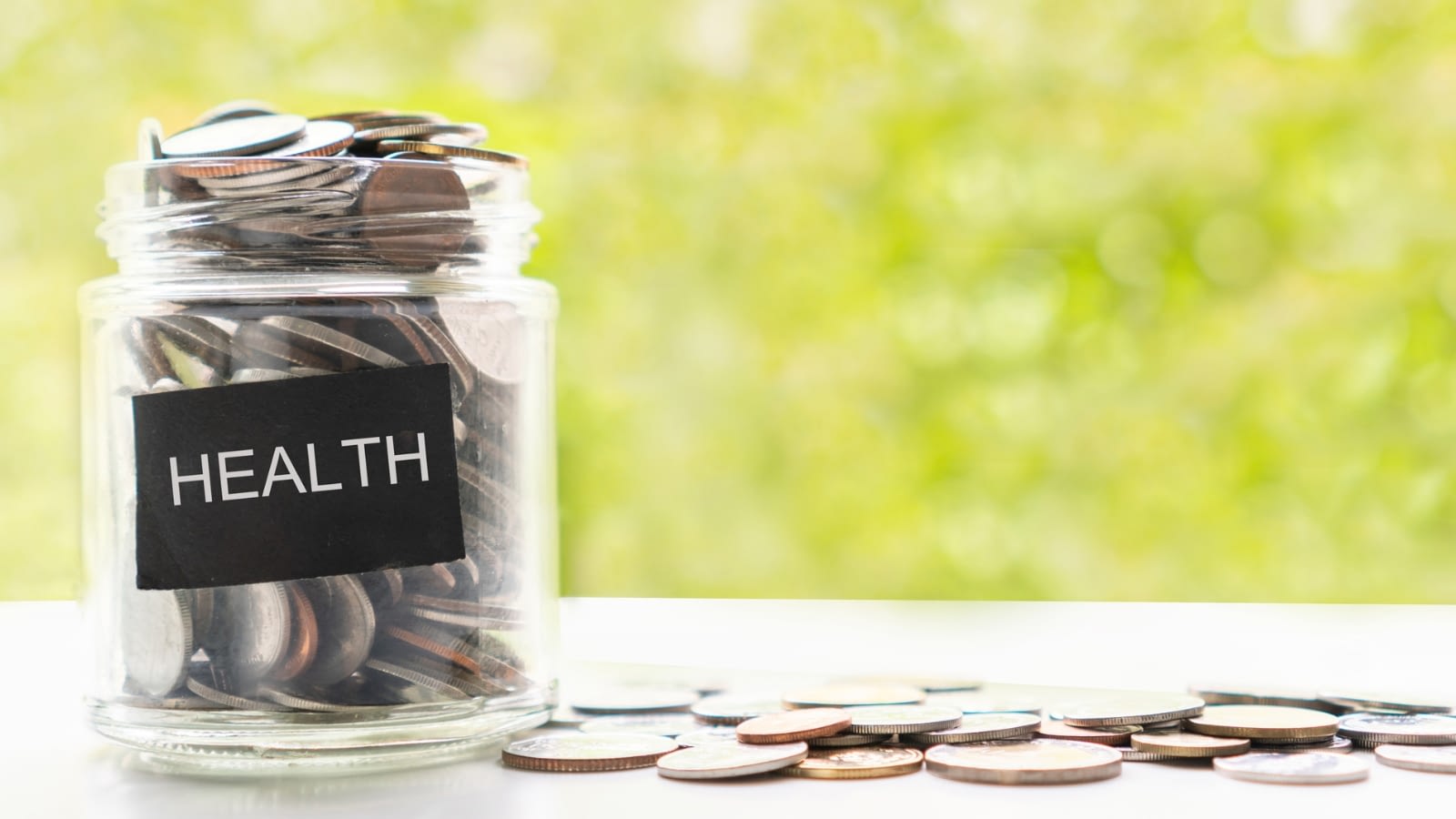 coins in a jar labeled health