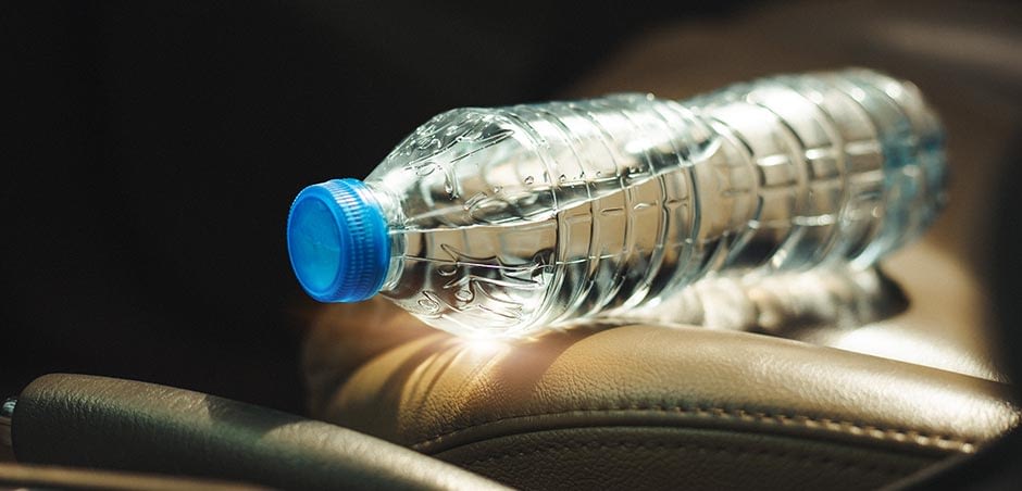 Plastic Bottle of Water on Car Seat