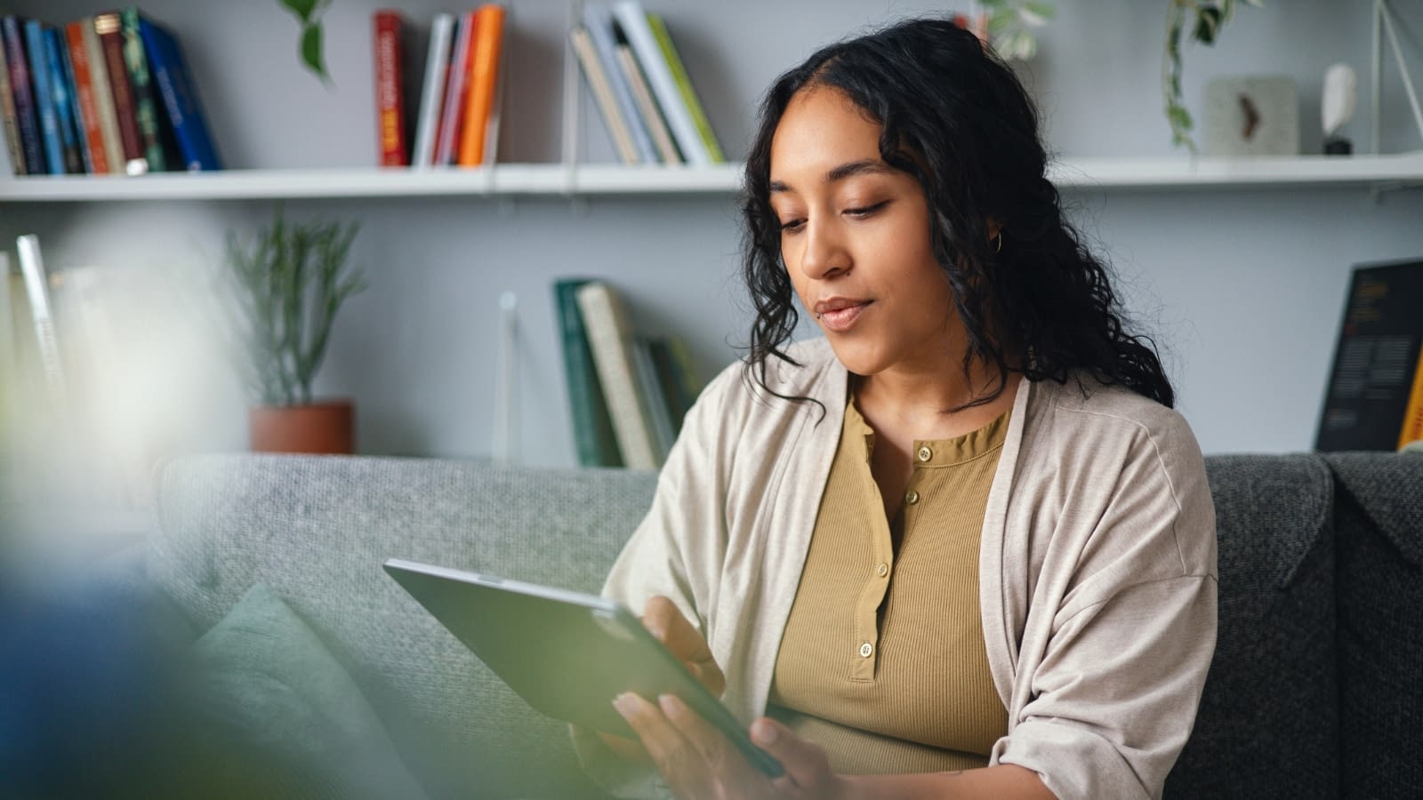 March 7 blog Young woman reading on ipad