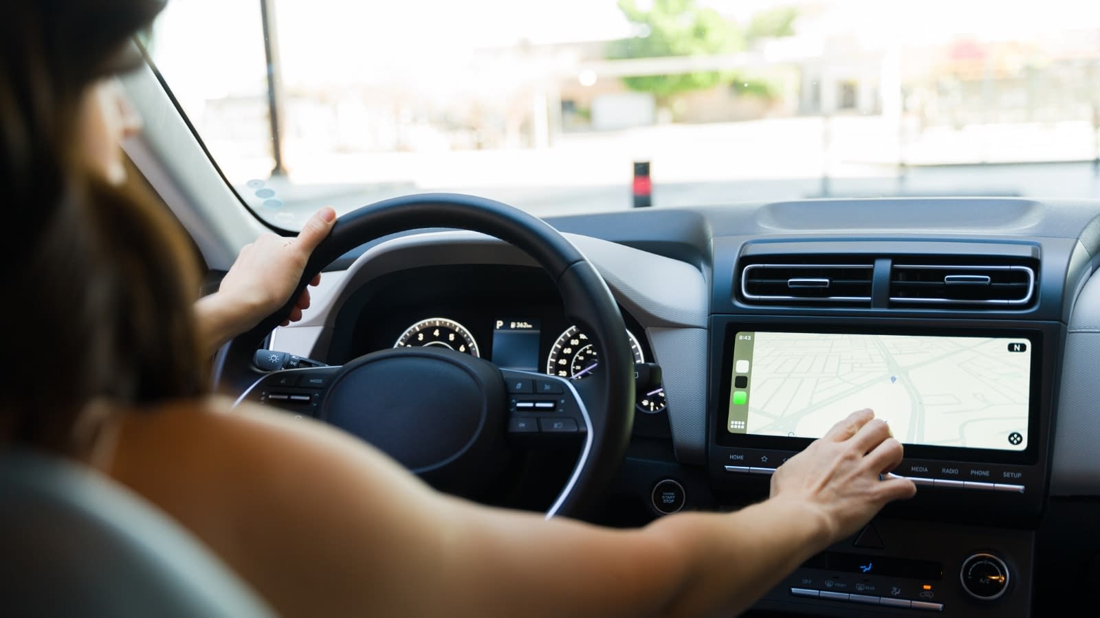 May 16 blog Woman using gps in car