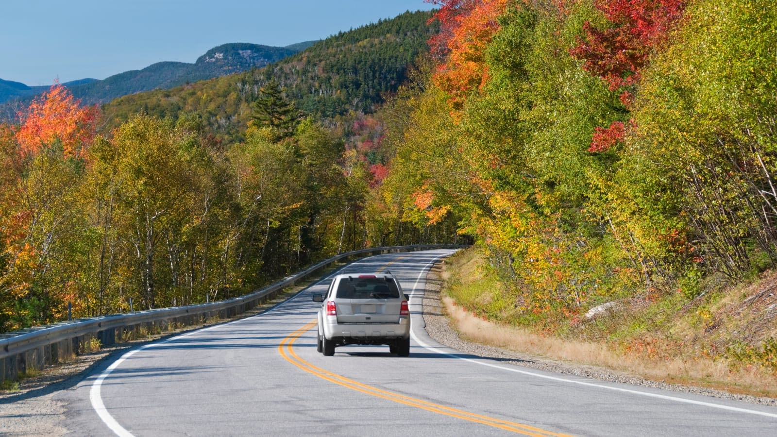 Nov 2 blog car driving on country road during autumn