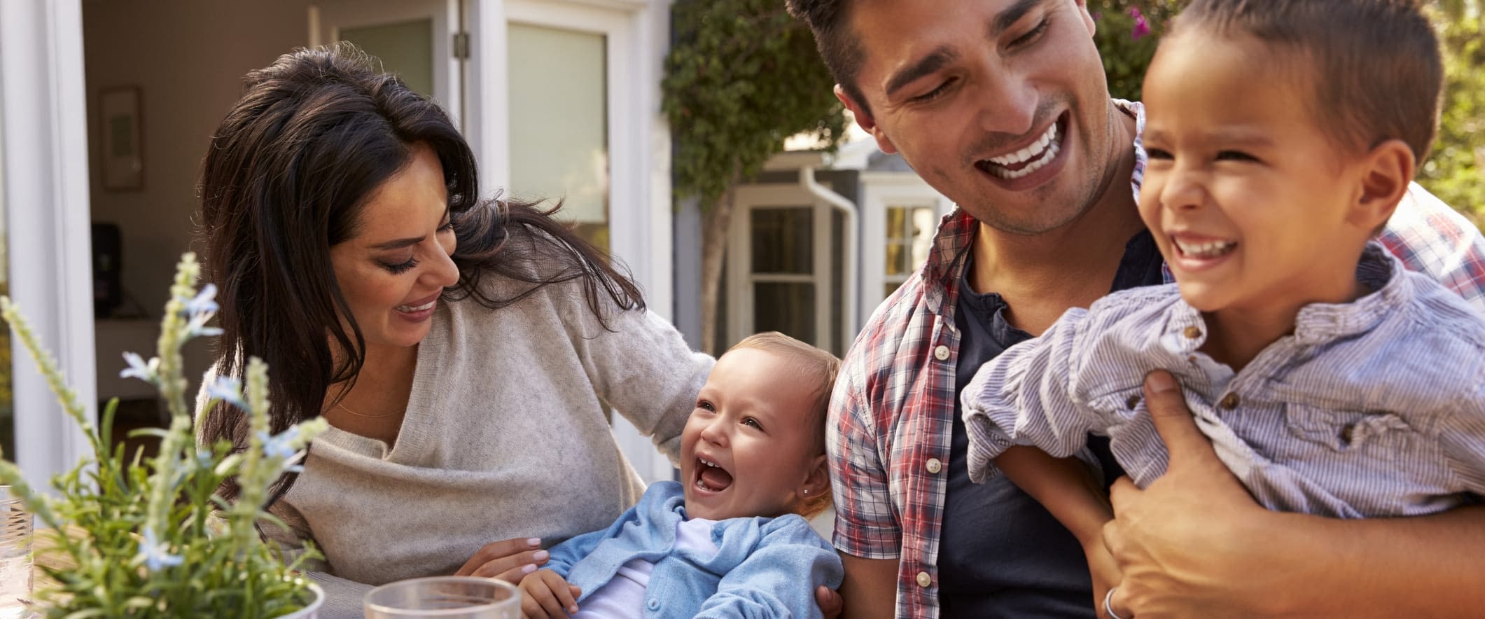 5 Life Insurance Myths Debunked Happy Latino Family Outside