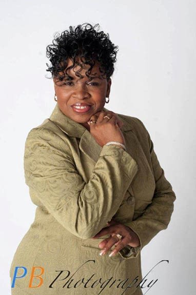 Sharon-in-light-green-suit-done-by-PB-Photography