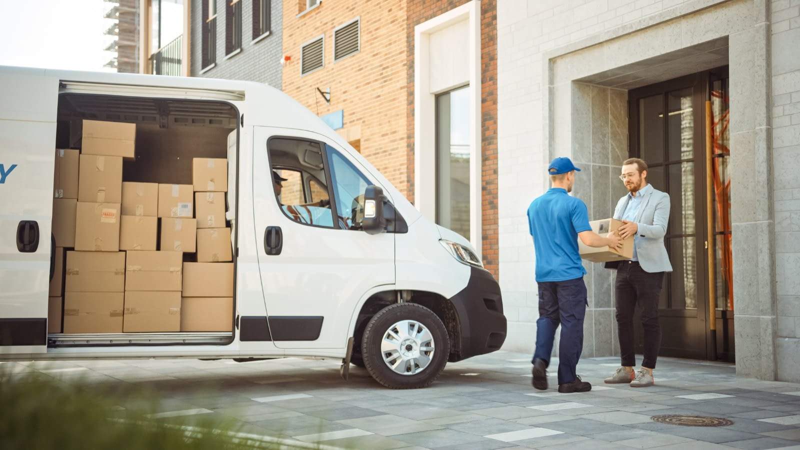 Commercial truck with boxes Working dropping off package