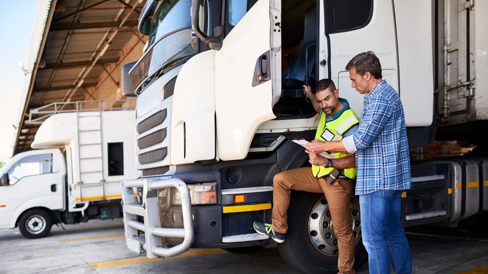 March 19 blog Truck drivers reviewing inventory