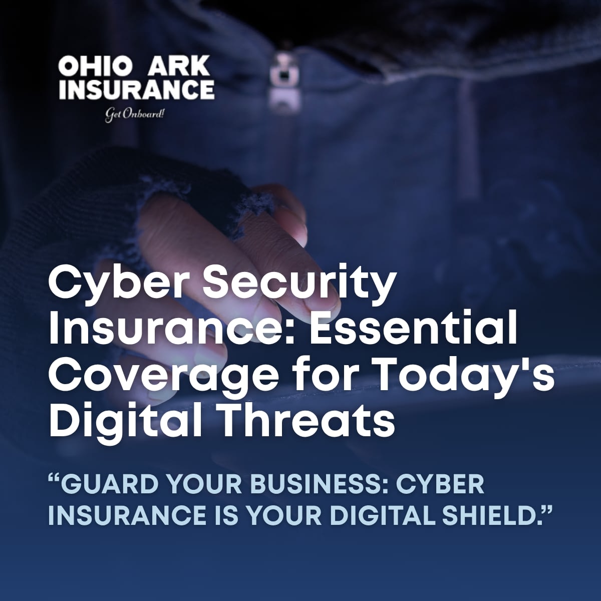 A business owner working at a desk, illustrating the importance of business protection from digital threats, a key aspect of Cyber Security Insurance.