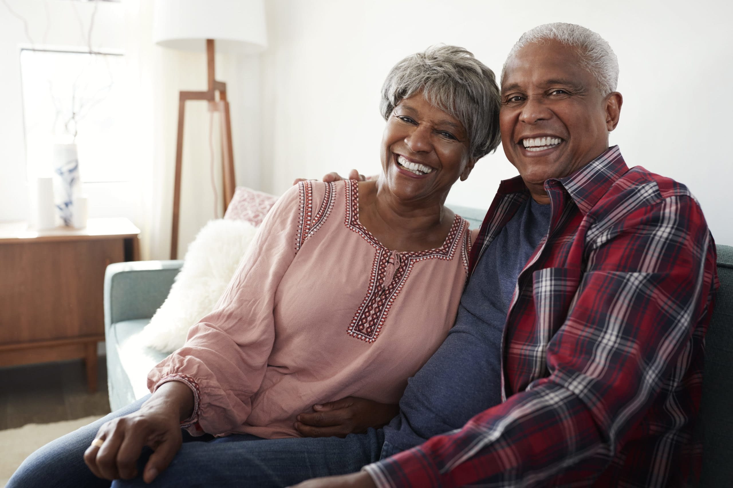 GettyImages-992097100 senior couple on couch