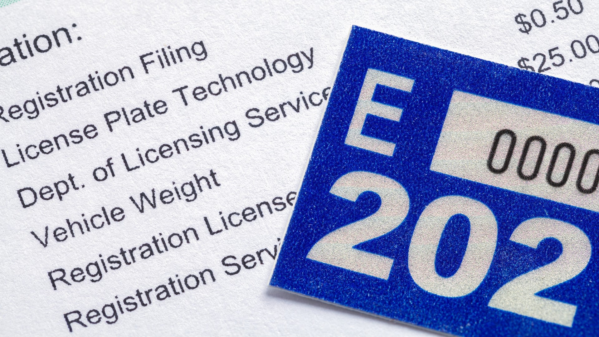 Close up of auto registration and license plate renewal sticker.