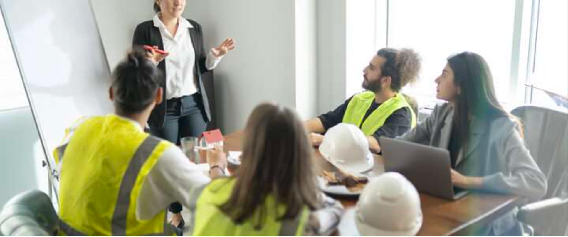 team sitting in a meeting
