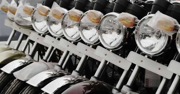 row_of_motorcycles_headlights_575x300
