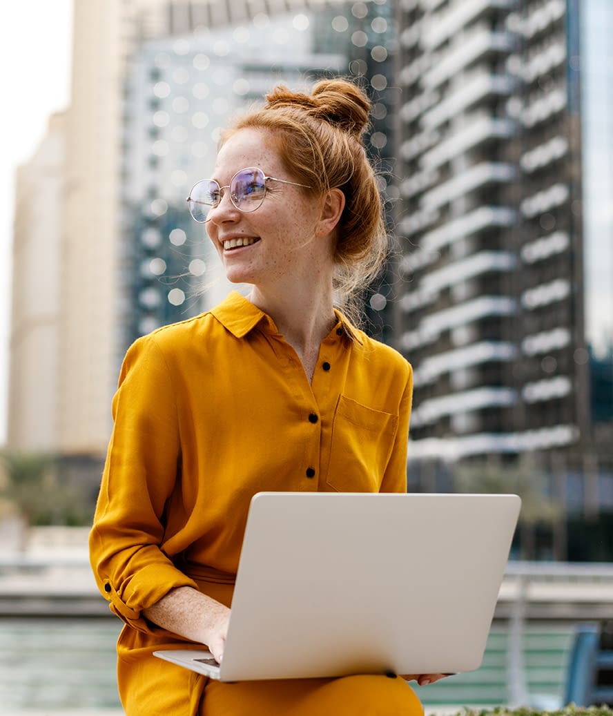 Young-Woman-sitting-and-work-on-laptop