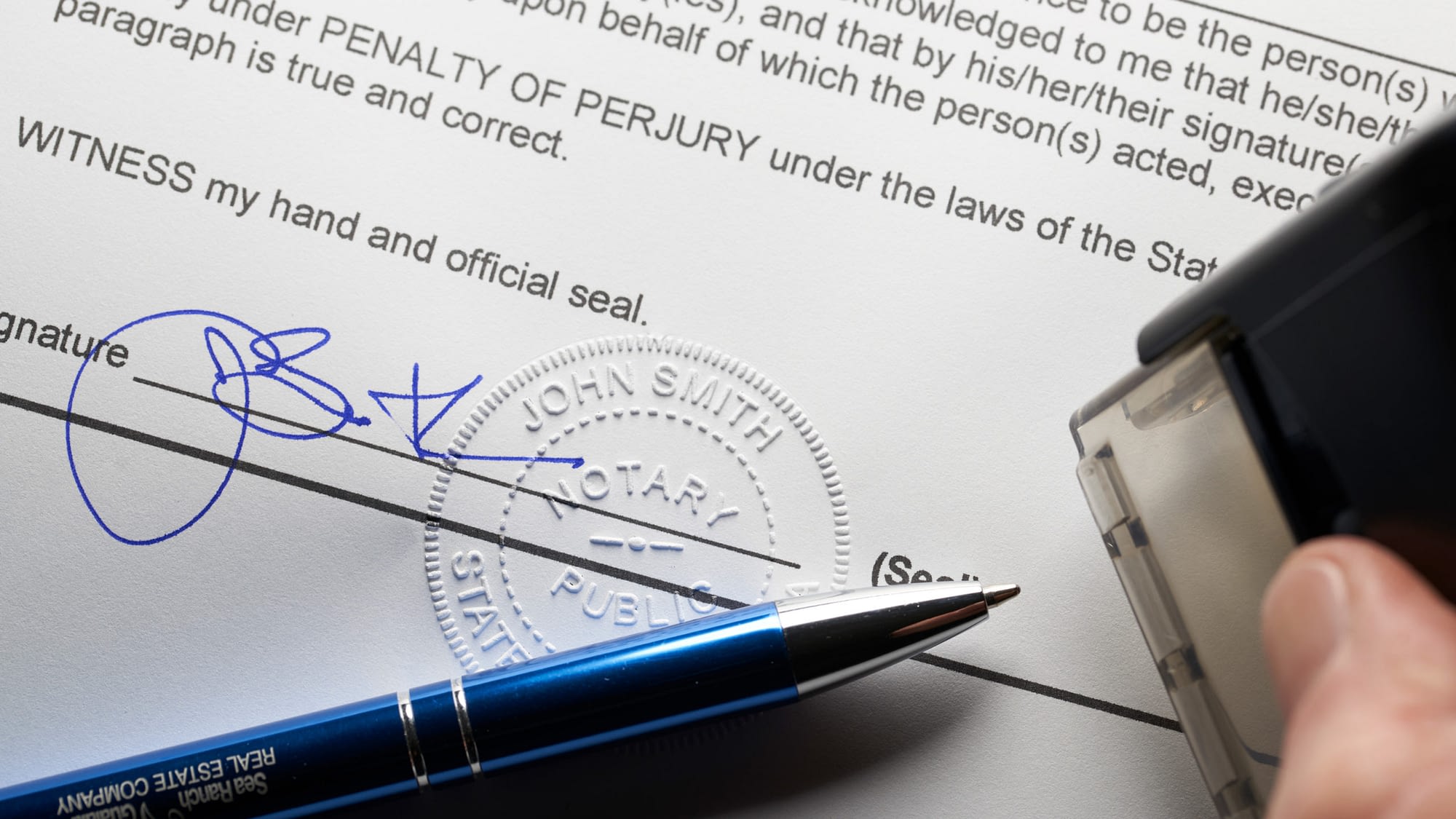 Close-up of notary seal on a legal document.