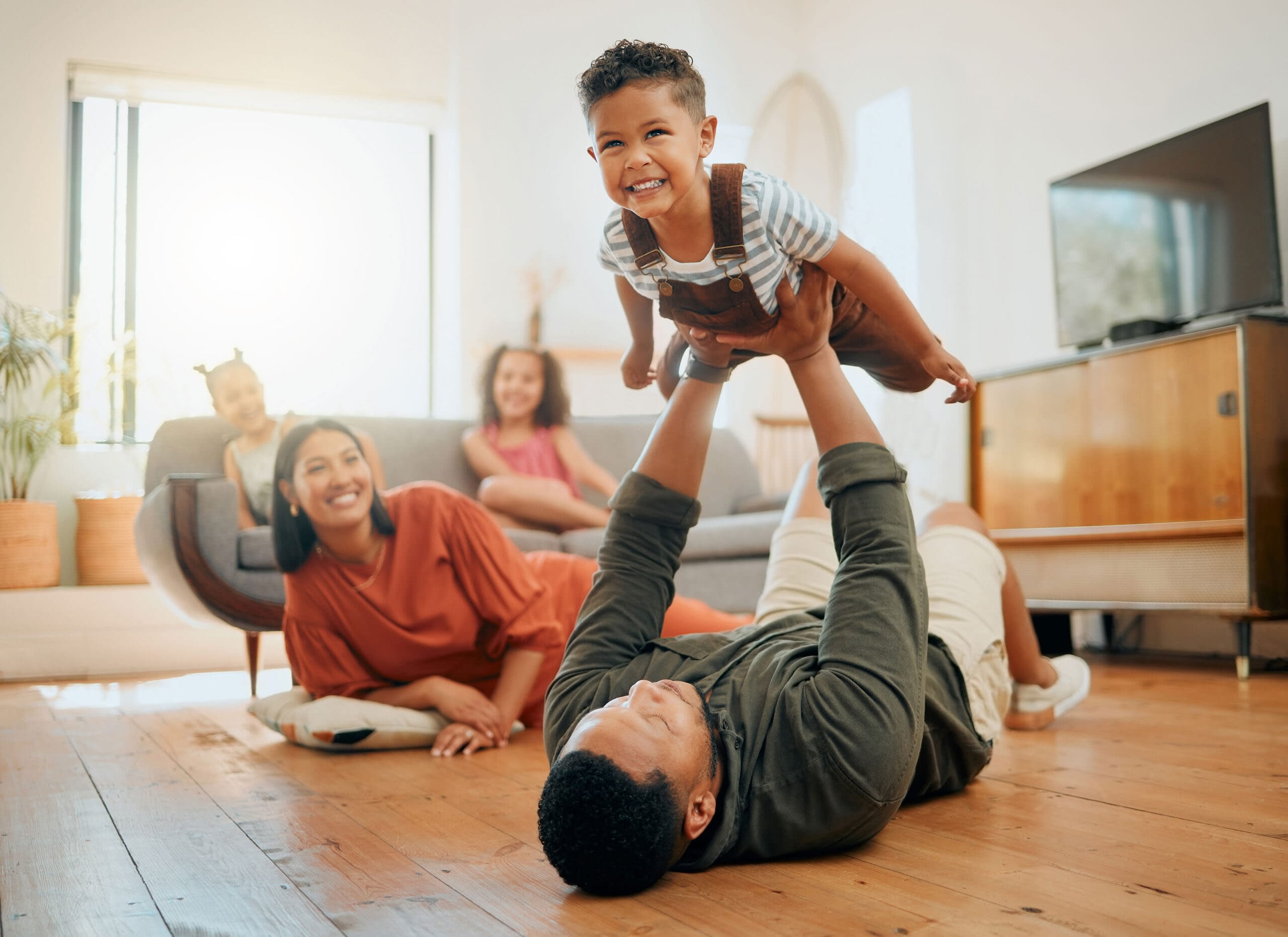 Family on the floor with kids