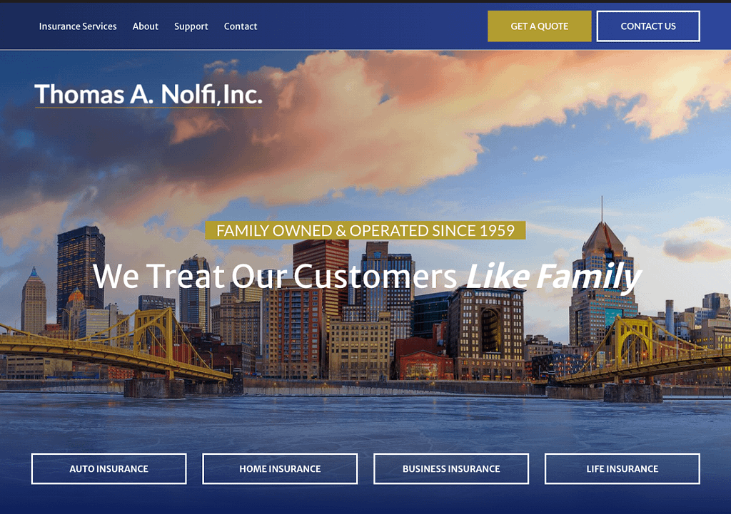 Full-width home page hero example with photo of the insurance agency's hometown in the background.