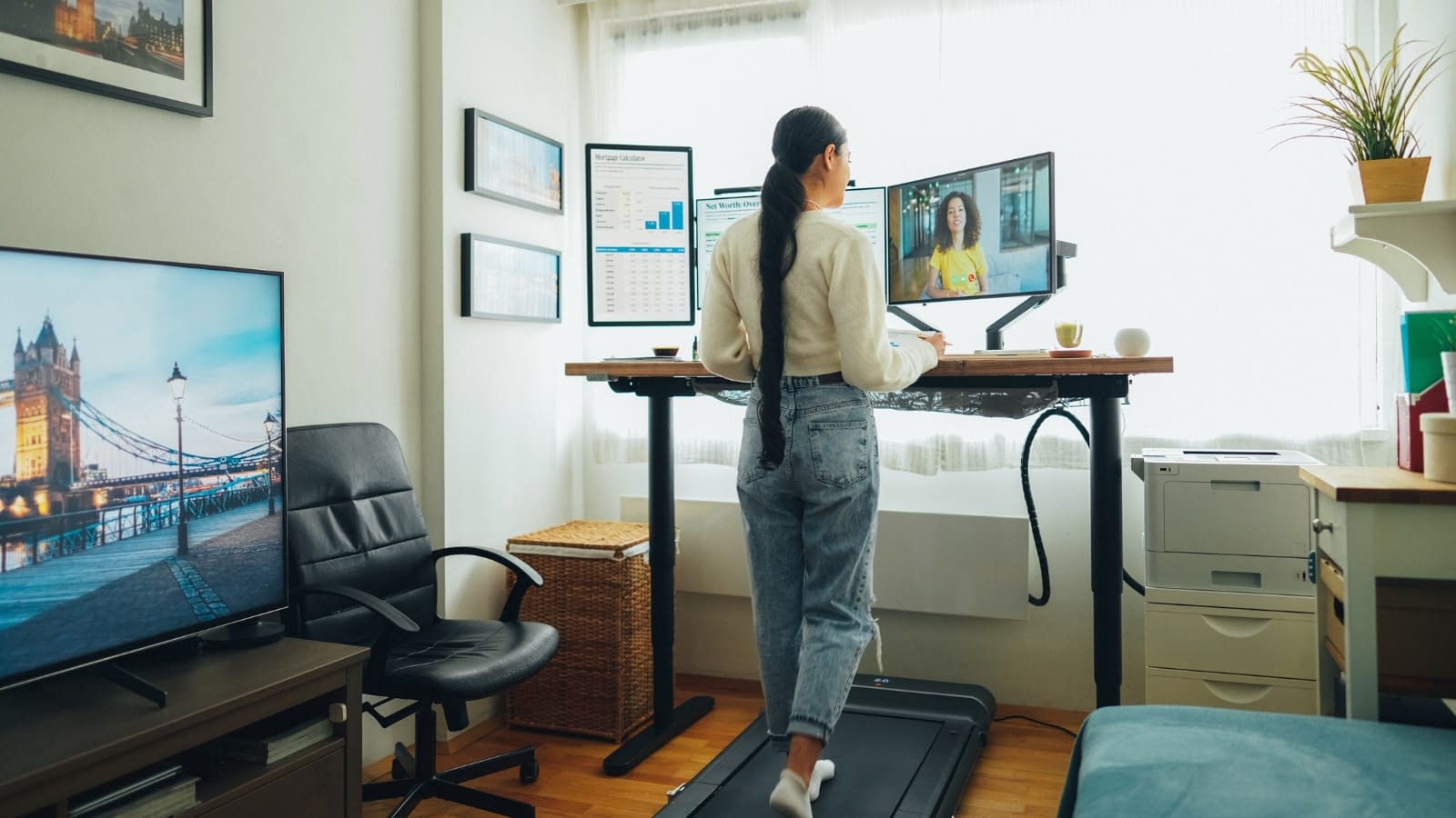 work-life boundaries woman working from home while walking on a treadmill