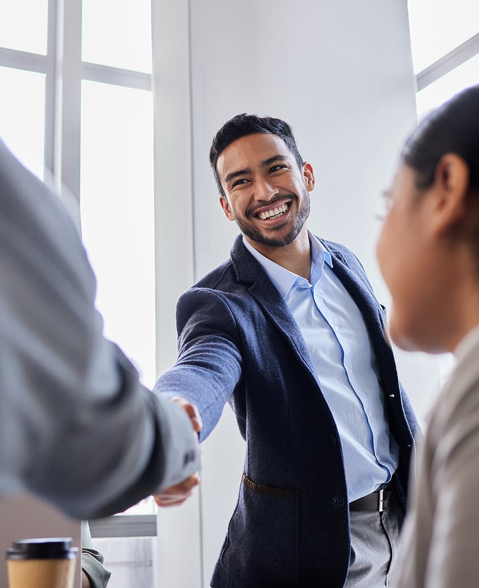 Shot-of-two-business-people-shaking-hands-during-a-meeting-v2