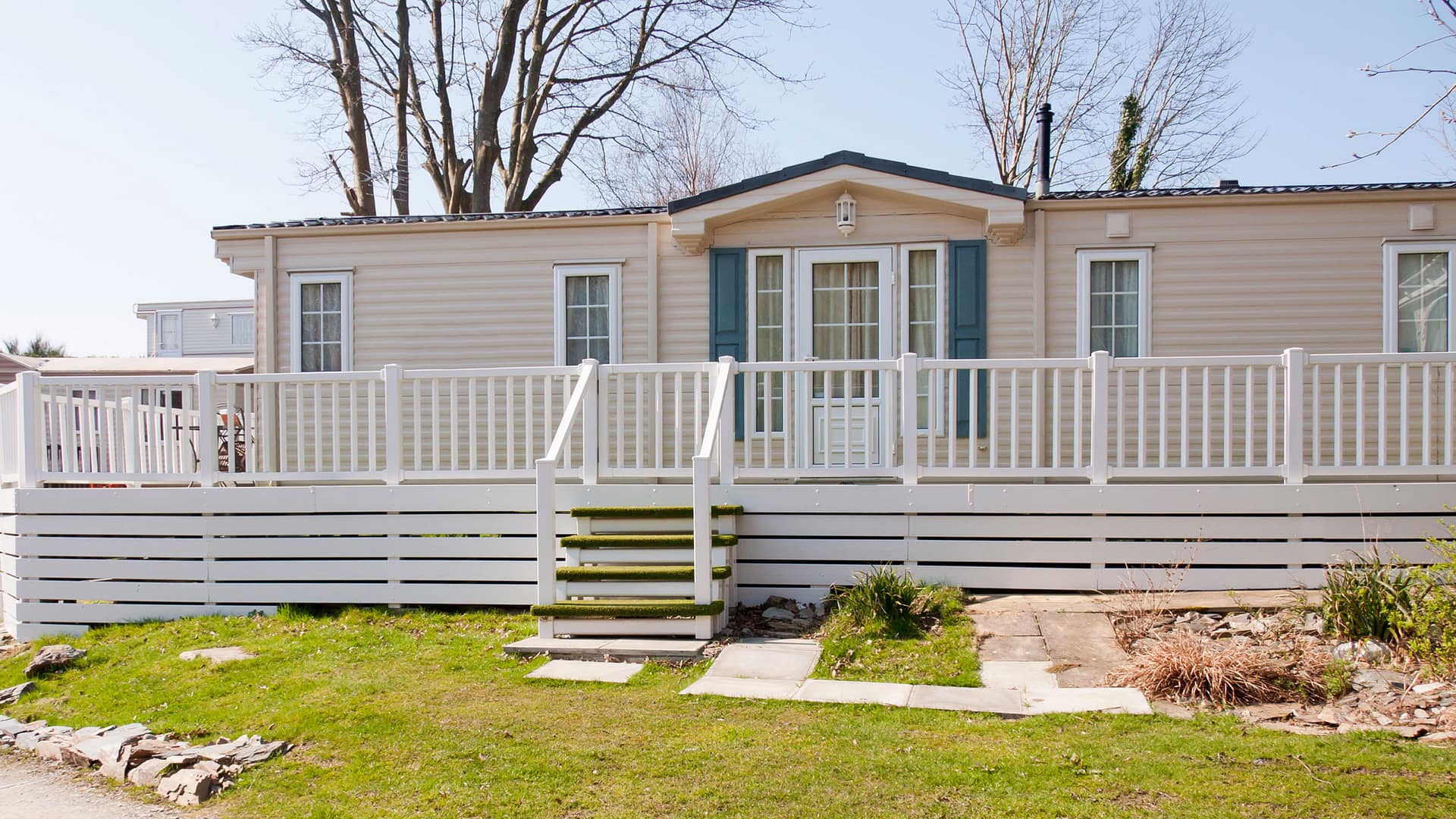 Exterior view of mobile home with front porch.