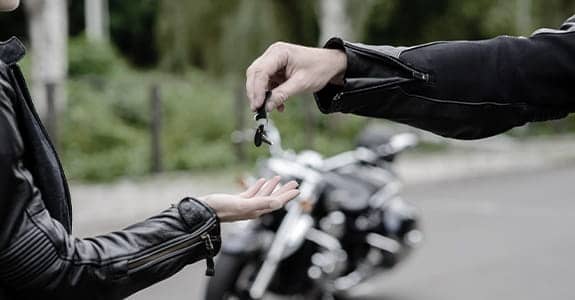 Handing Over Motorcycle Keys
