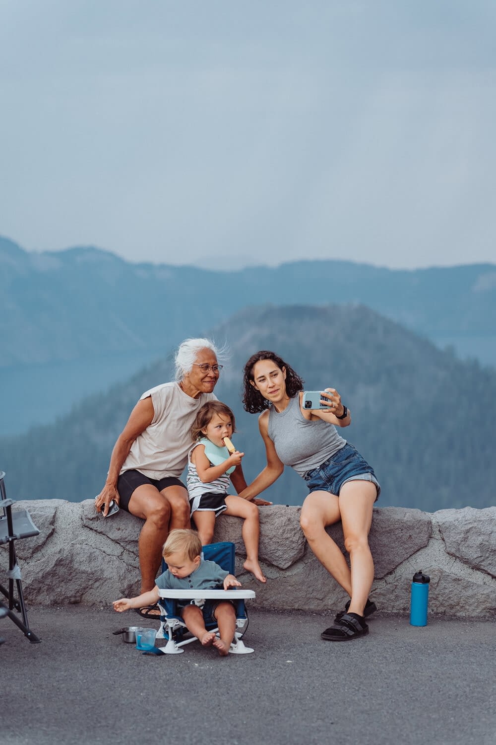 multi-generation-family-taking-selfie-in-outdoors multi generation family taking selfie