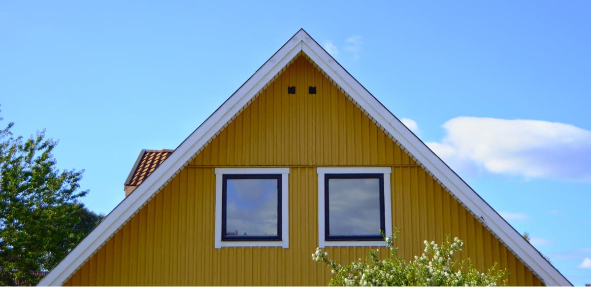 January 26′ Langer Mailchimp picture of a yellow house top with a blue sky