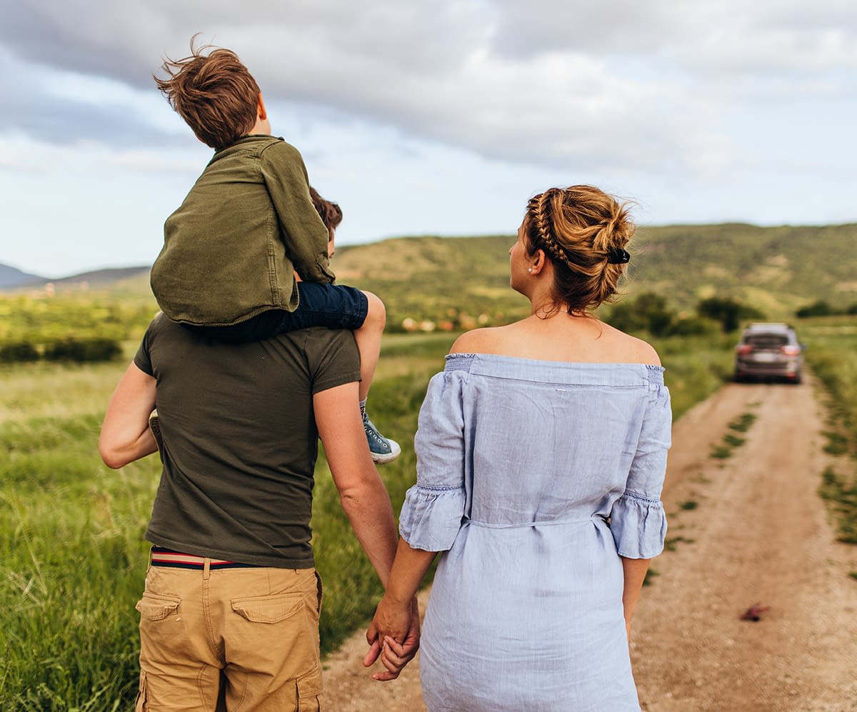 family of three walking