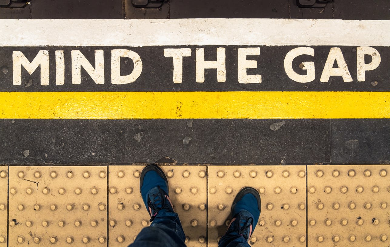 Mind The Gap warning on London Underground A personal perspective looking down at a 'Mind The Gap' warning at the edge of the platform at a London Underground station.