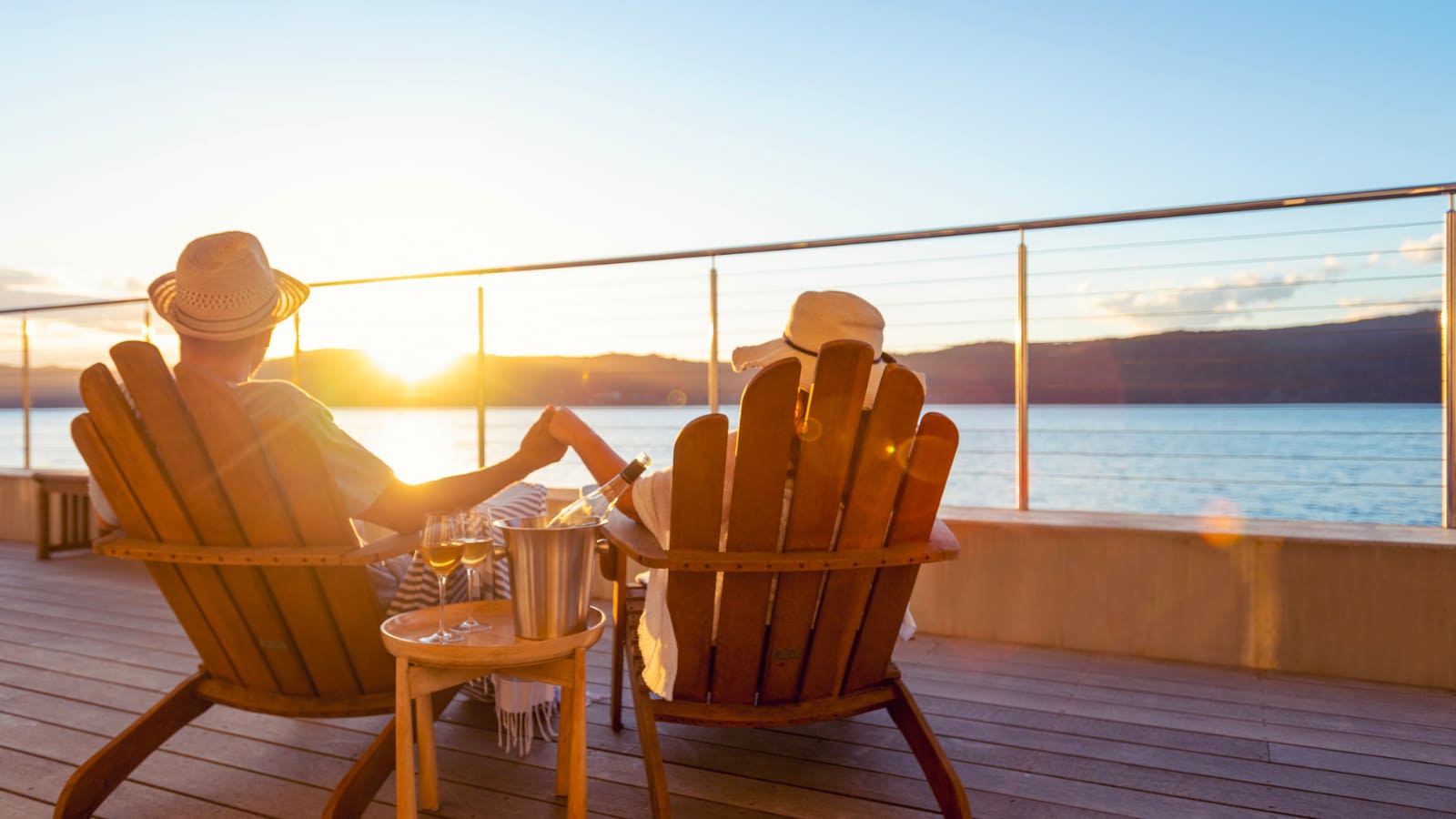 6 Couple relaxing and holding hands