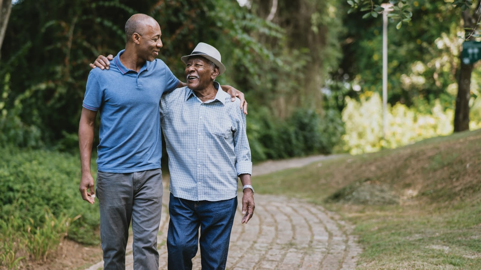 medigap insurance father and son walking on a stone path