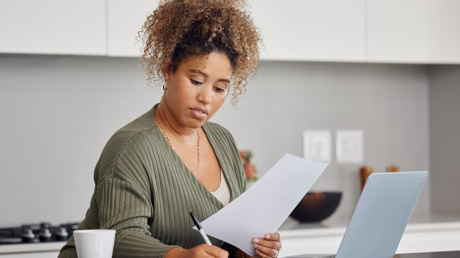 March 25 blog Young woman reading paperwork