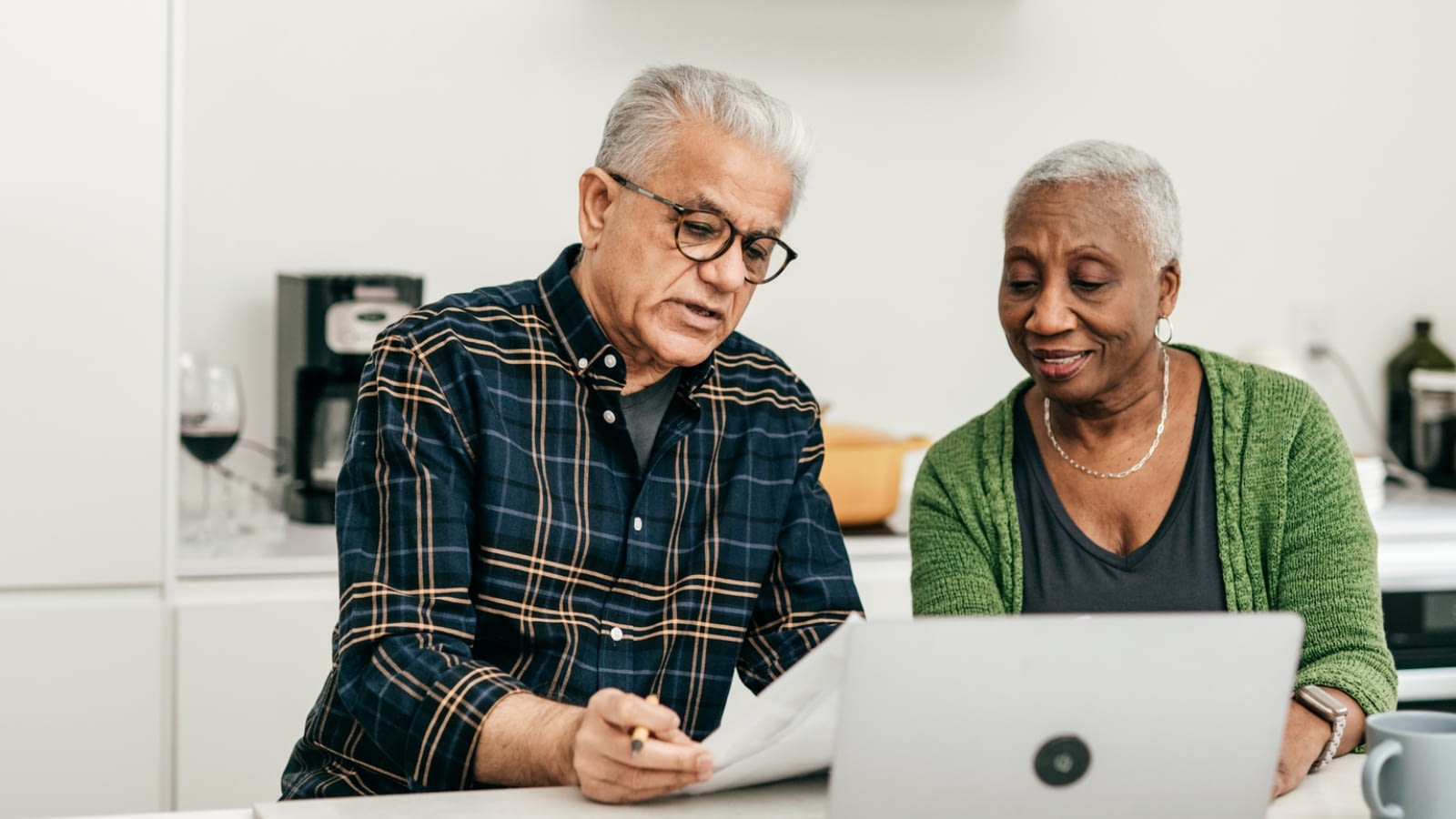 senior couple reviewing documents