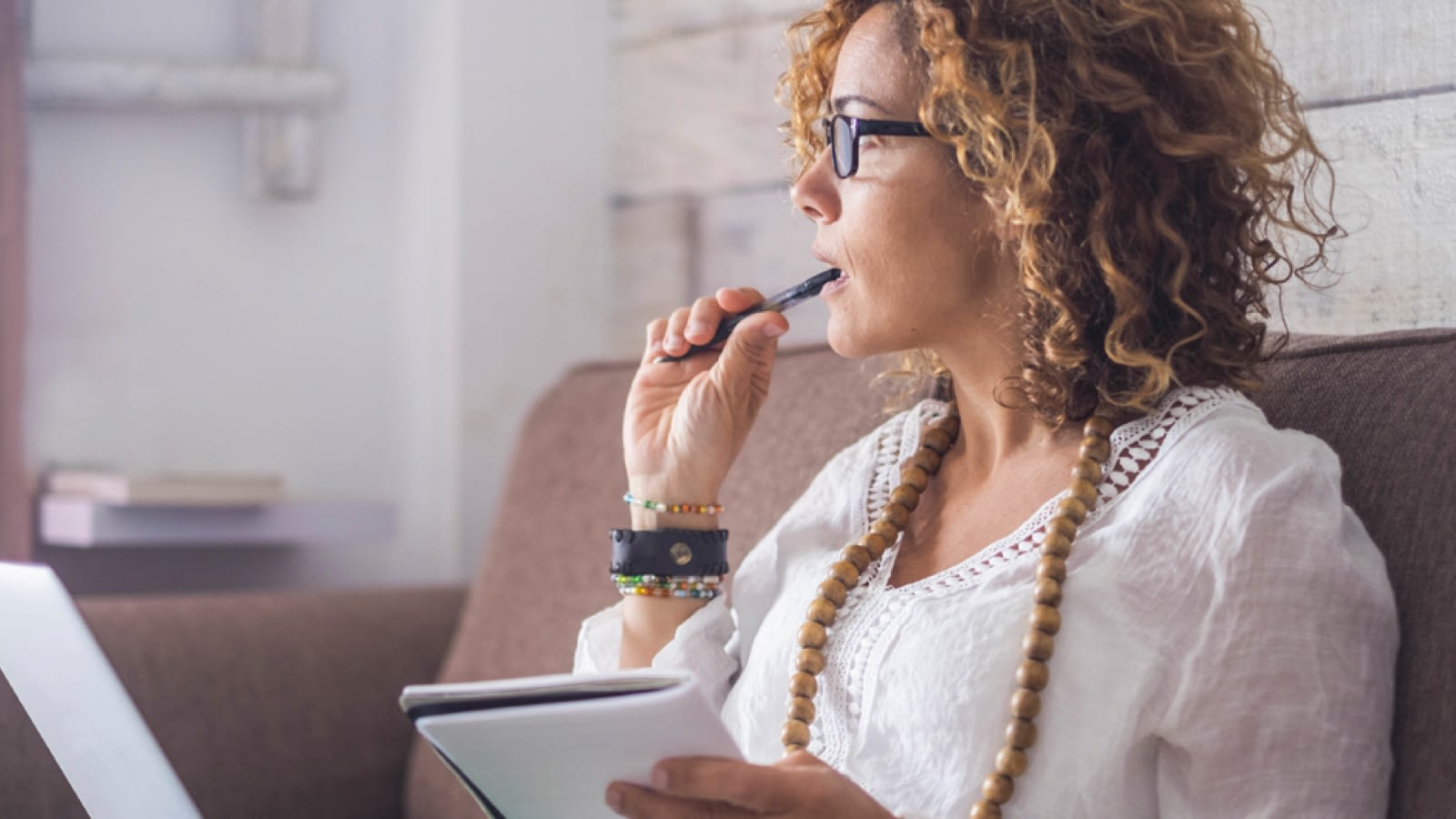 Woman drafting an obituary