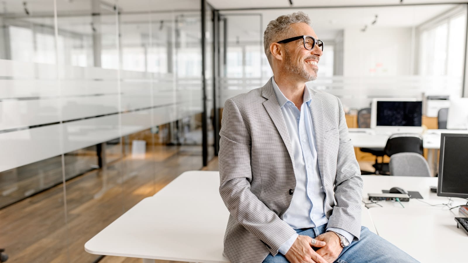 Oct 19 blog male business owner leaning on desk