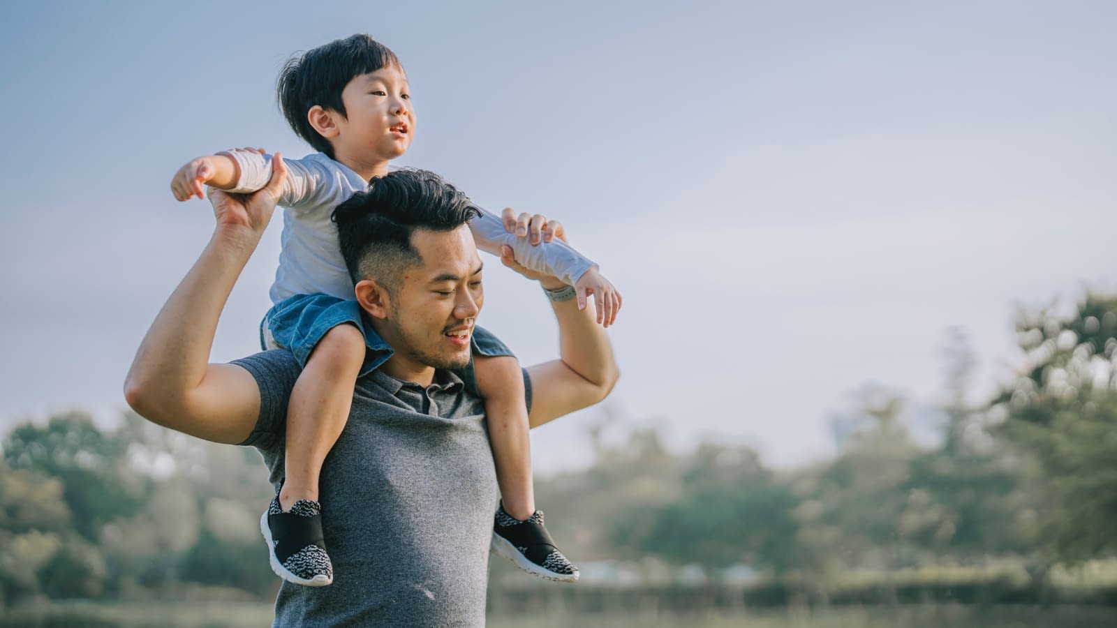 term life insurance son sitting on father's shoulders