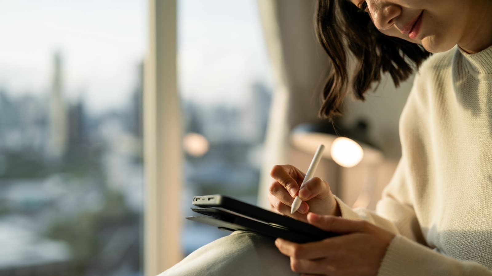 Jan 1 blog woman reading insurance information on ipad