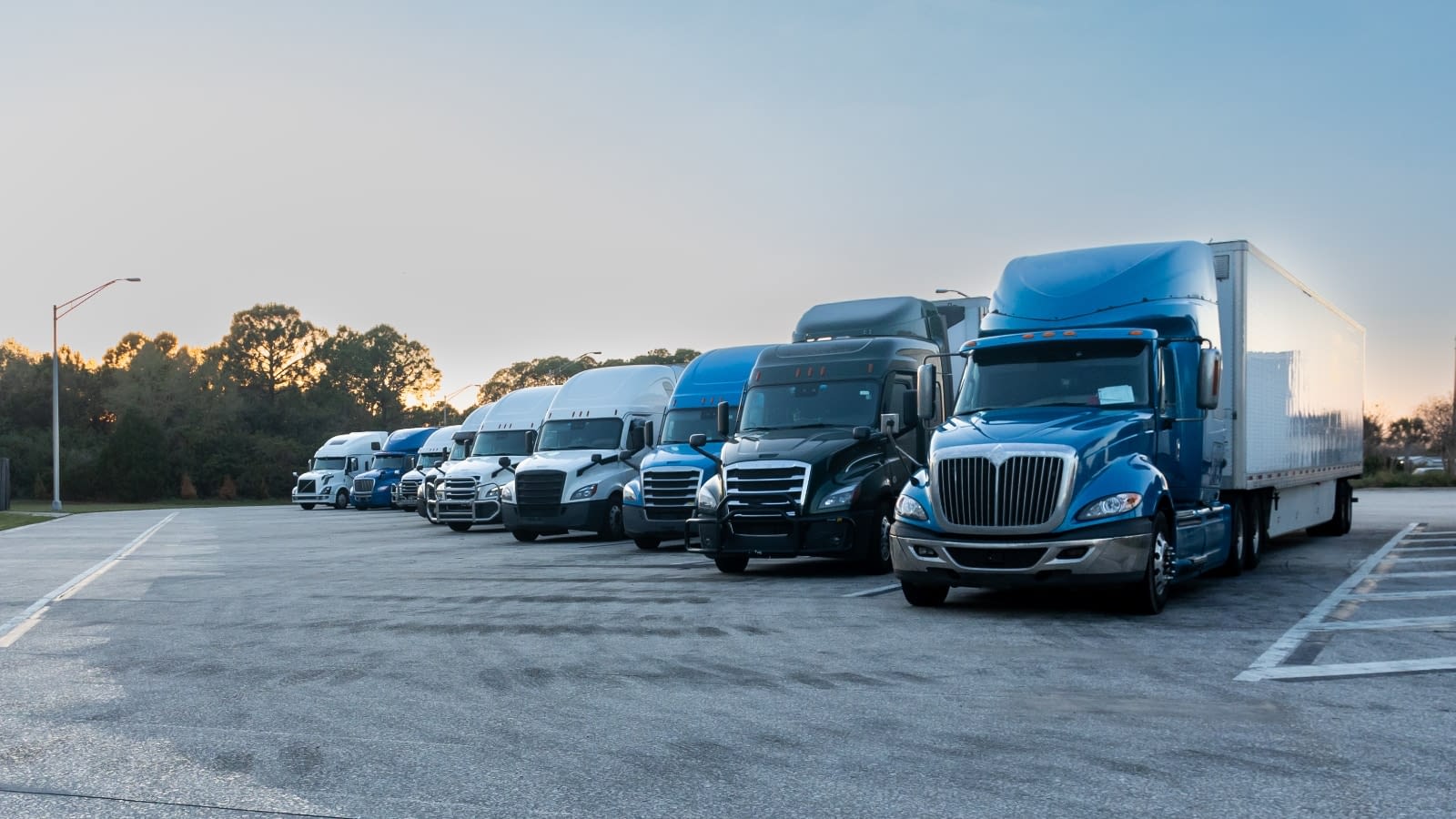 Jan 4 blog Fleet of commercial trucks in parking lot