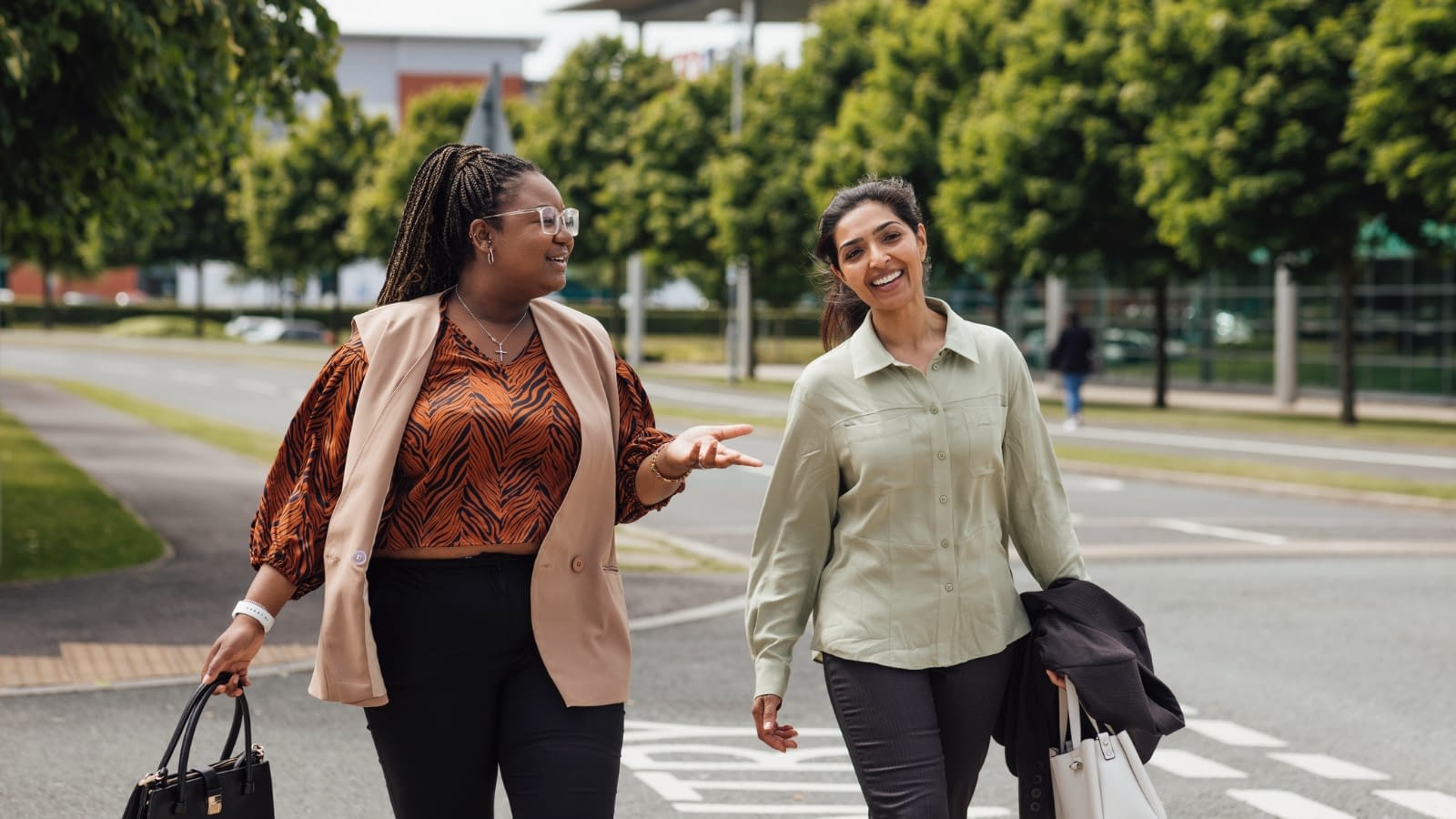 September 28 blog Two female co-workers walking to work and talking