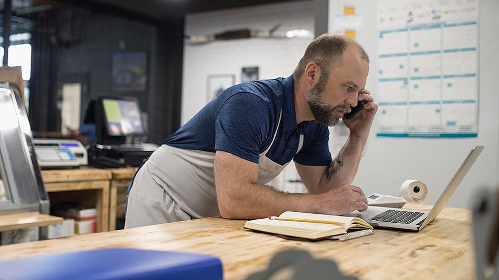 Small business owner talking on the phone