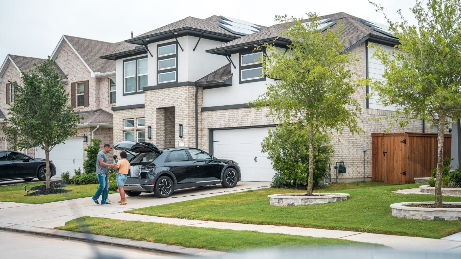 March 16 blog Family loading car in front of house